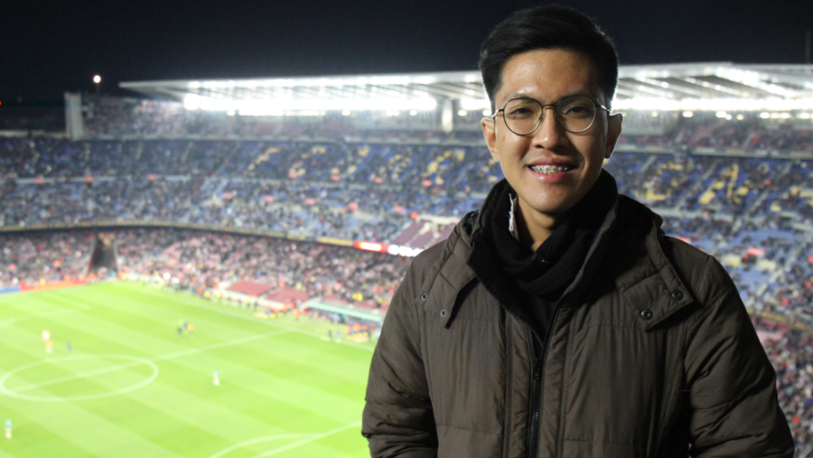 Akid catching a football match at the FC Barcelona Stadium, Spotify Camp Nou in Barcelona, Spain