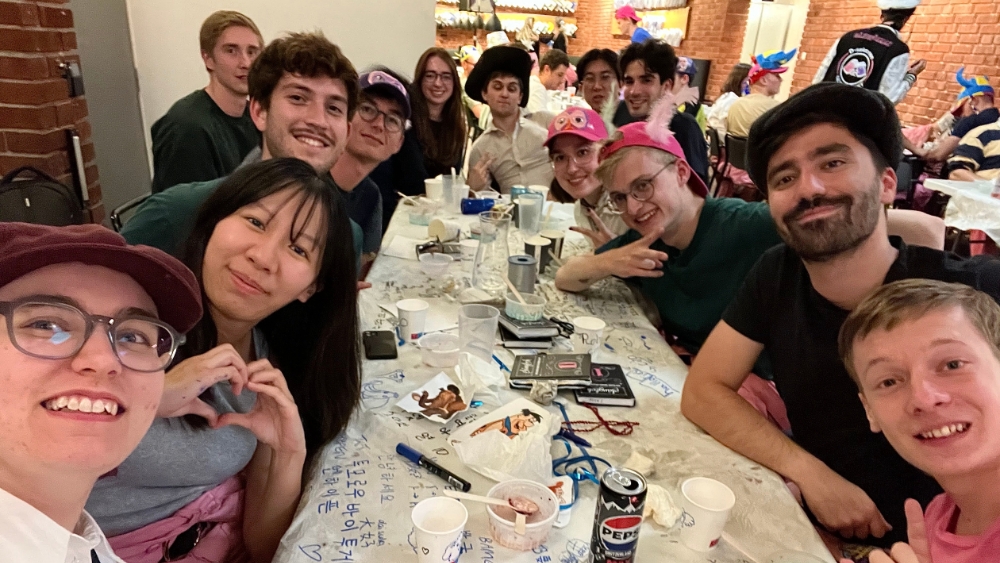 Amelia with other students at a student dinner called sittning