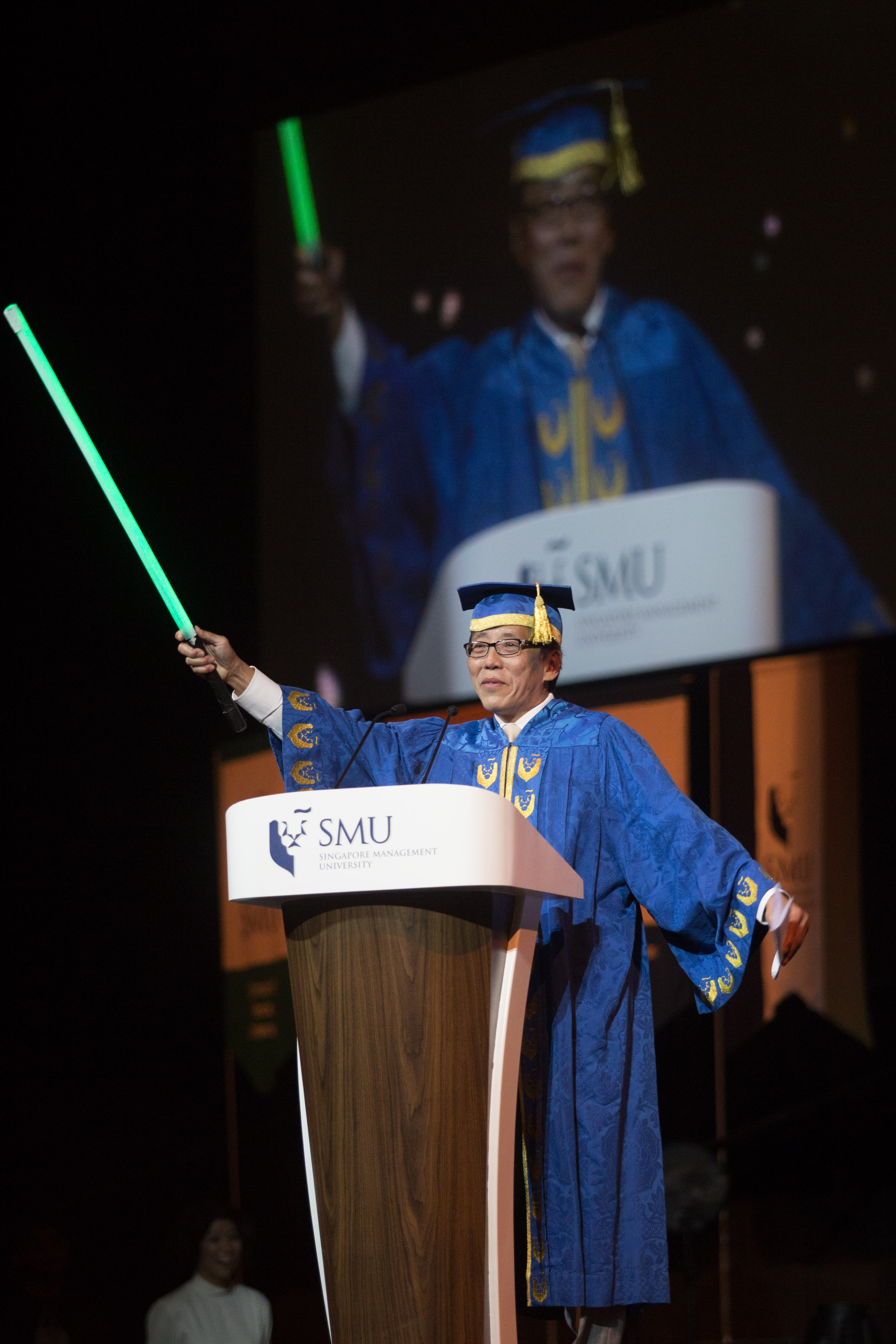 SMU Convocation 2014: Mr Ho Kwon Ping, Chairman of SMU Board of Trustees, brandishes a lightsaber during his opening address, to rapturous applause.