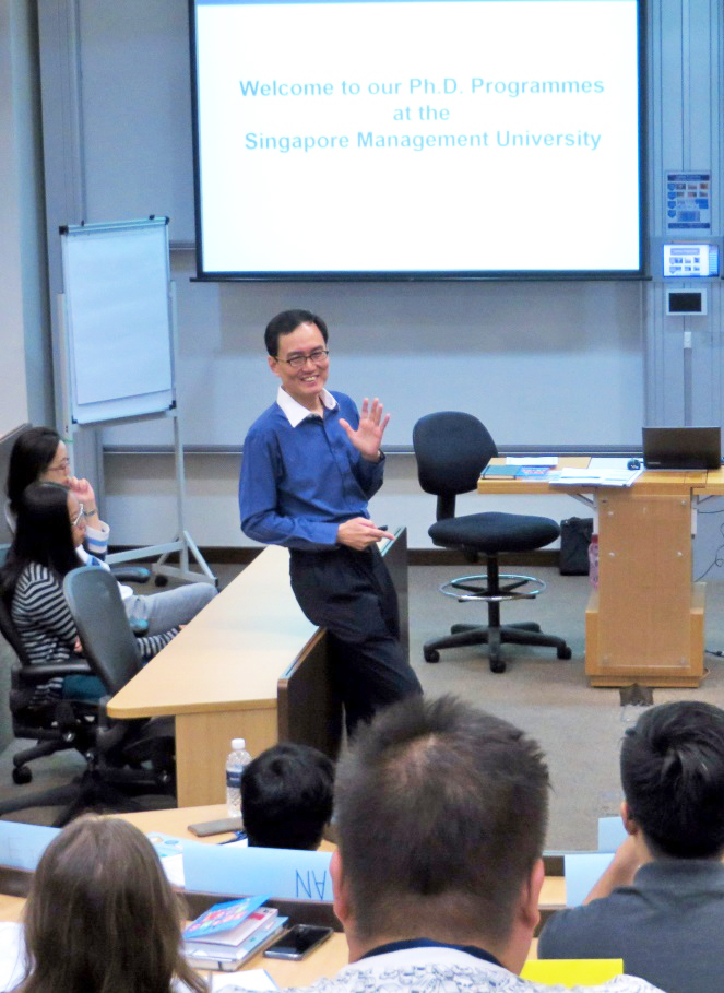 Professor Pang speaking to the new batch of PhD students at the welcome orientation