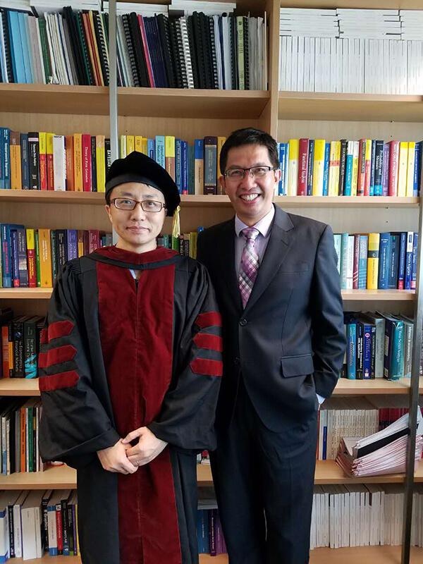 Jiang Liang with Professor Jun Yu after his graduation