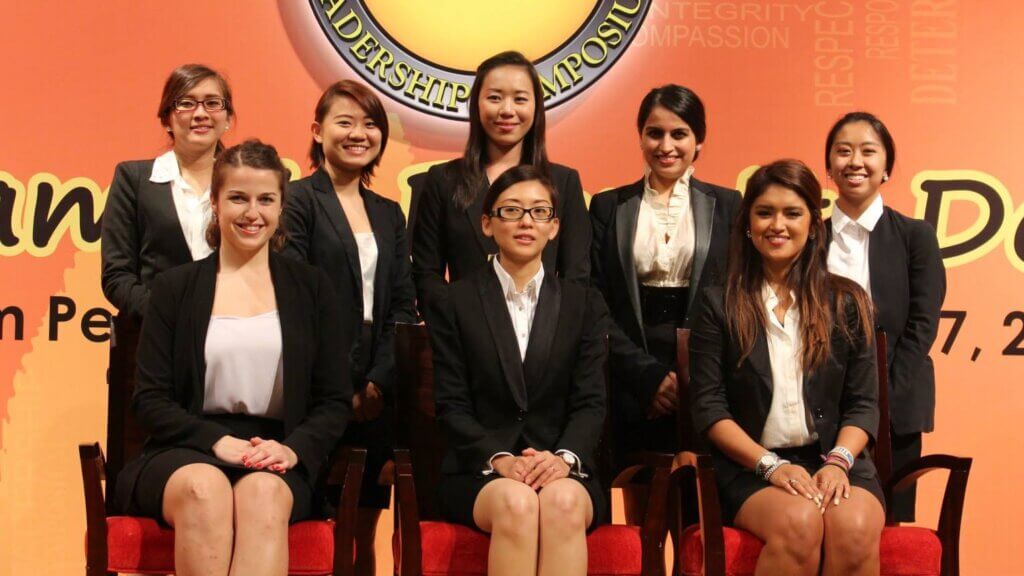 Li-En (back row, centre) with fellow housemates on one of her internships