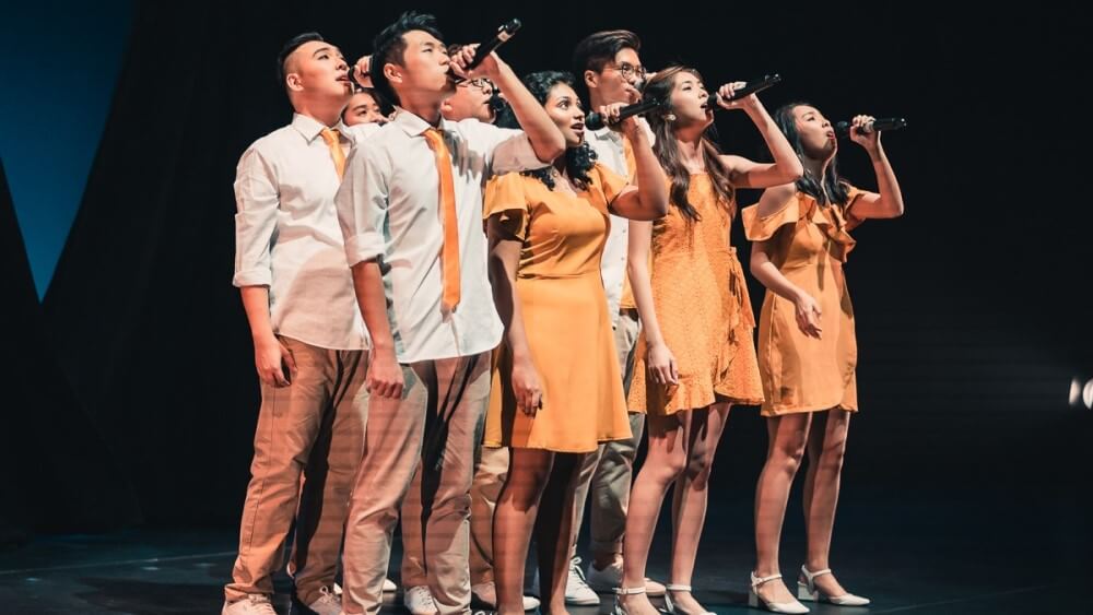 Edward performing with fellow choir mates of SMU VOIX