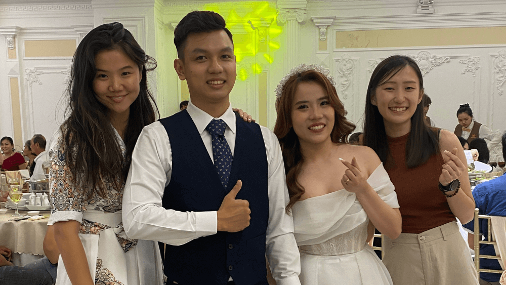 Raeann (extreme left) attending her supervisor’s wedding 